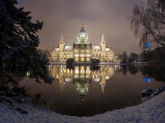 city-hall-hannover-germany-winter-night-stars-reflection-lake-46405529